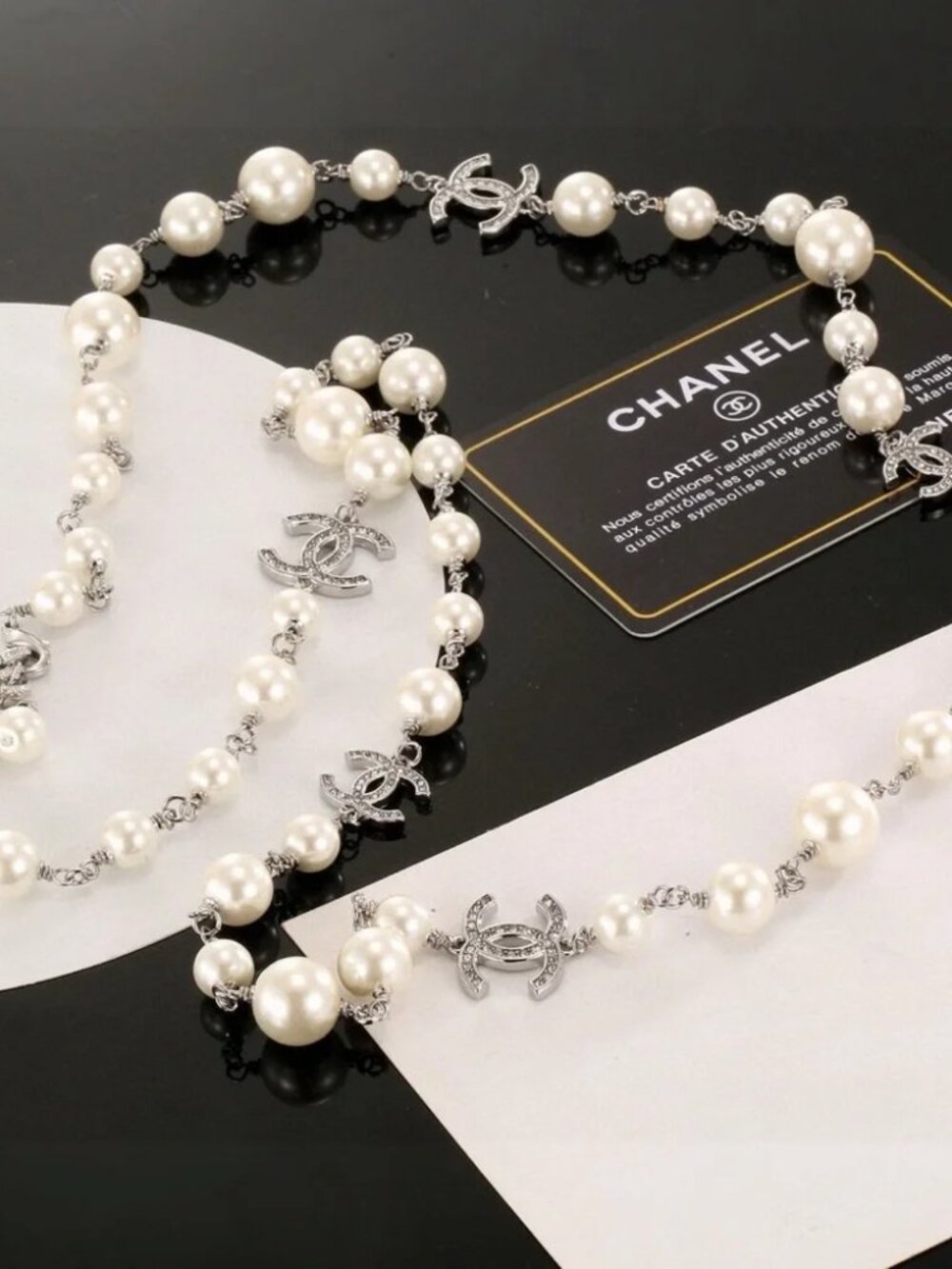 Chanel pearl sweater chain